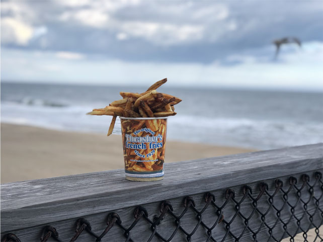 Thrasher's Fries on the pier with the beach in the background